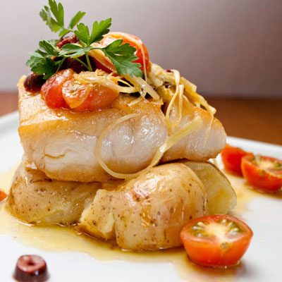 image of fish on a plate with garnish